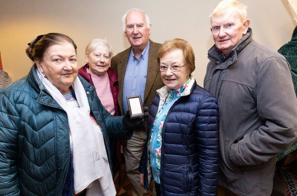 Mary Hogan holds a photograph of Rev Adam Bettisworth-Perry, the rector of Carlow in 1864, who performed the wedding ceremony of Ernest Shackleton's parents in St Mary's Church on 20 February 1872. Also pictured are Mary McDonnell, Paul Lyons and Robin and Nora James Mary Hogan holds a photograph of Rev Adam Bettisworth-Perry, the rector of Carlow in 1864, who performed the wedding ceremony of Ernest Shackleton's parents in St Mary's Church on 20 February 1872. Also pictured are Mary McDonnell, Paul Lyons and Robin and Nora James