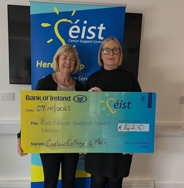 Owner of Carlow College of Music, Majella Swan presenting the proceeds of the concert to a member of Éist Cancer Support Centre  Owner of Carlow College of Music, Majella Swan presenting the proceeds of the concert to a member of Éist Cancer Support Centre