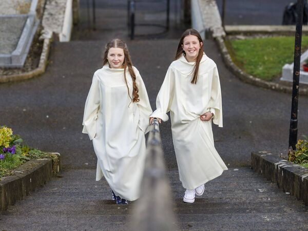 March: Erin Dagg and Sarah Milton ascend the steps of Holy Cross Church, Killeshin as they arrive for their Confirmation day March: Erin Dagg and Sarah Milton ascend the steps of Holy Cross Church, Killeshin as they arrive for their Confirmation day