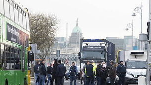 Police in Belfast attacked with petrol and paint bombs Police in Belfast attacked with petrol and paint bombs