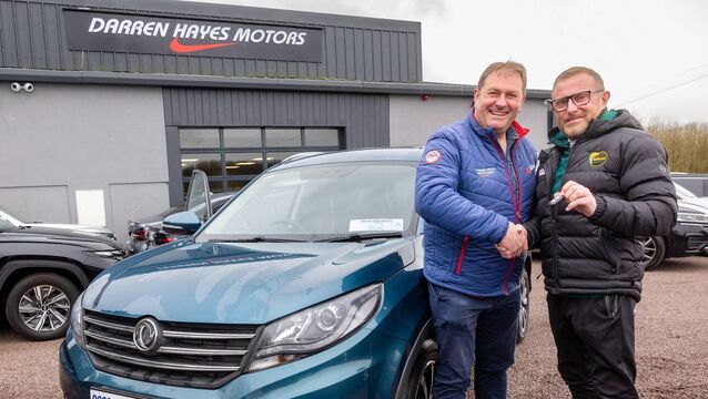 Senior football manager Joe Murphy presented with a car from Darren Hayes Motors Senior football manager Joe Murphy presented with a car from Darren Hayes Motors